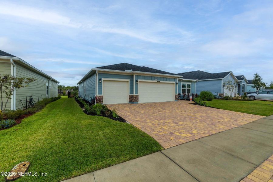 Exterior details and patio area of a home in Edenbrooke at Hyland Trail | 55+: Edenbrooke at Hyland Trail 60s, Green Cove Springs (Image 24). Exterior details and patio area of a home in Edenbrooke at Hyland Trail | 55+: Edenbrooke at Hyland Trail 60s, Green Cove Springs (Image 24).