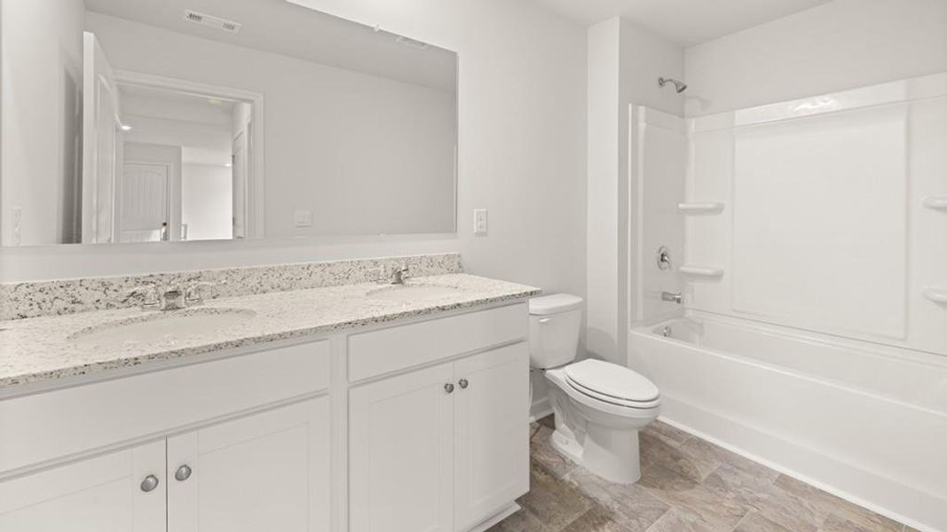 Furnished interior view inside a new home in Parkside at Carter Grove, Cartersville (Image 4).