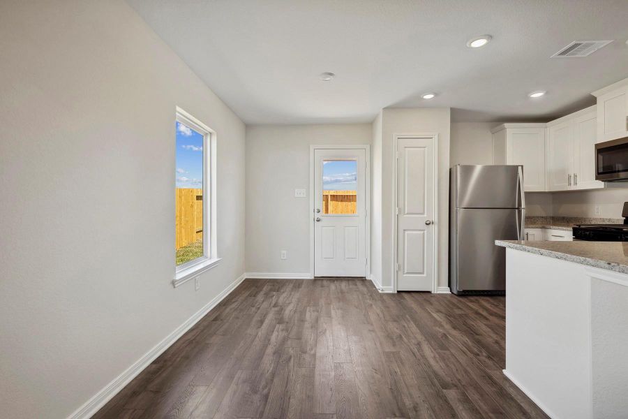 Spacious, unfurnished interior of a new home in Vacek Country Meadows, Richmond (Image 11).