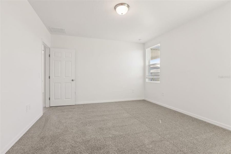 Spacious, unfurnished interior of a new home in Springs at Lake Alfred - Signature Series, Lake Alfred (Image 28).