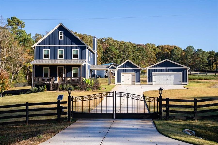 Front exterior of a new home in , Commerce, GA, highlighting curb appeal (Image 1).
