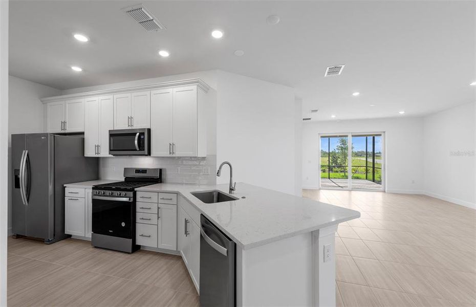 Furnished interior view inside a new home in BeachWalk by Manasota Key, Englewood (Image 6). Furnished interior view inside a new home in BeachWalk by Manasota Key, Englewood (Image 6).