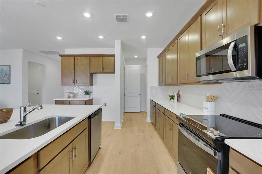 Furnished interior view inside a new home in Green Key Village, Lady Lake (Image 9).
