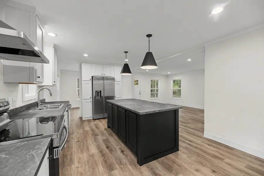 Furnished interior view inside a new home in , St. Stephen (Image 7).
