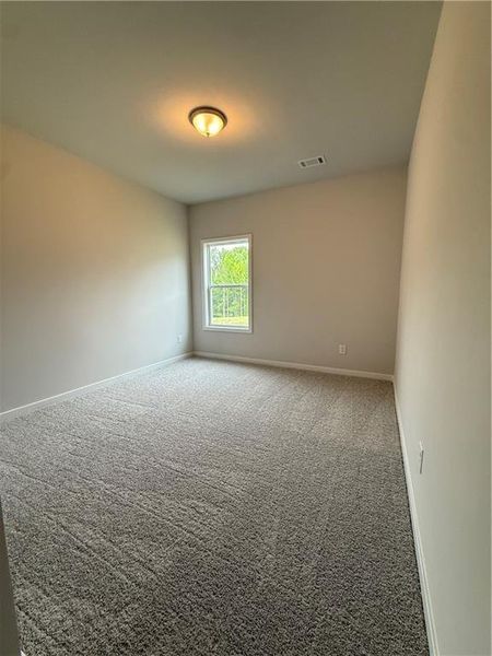 Spacious, unfurnished interior of a new home in Ponderosa Farms Reserve, Gainesville (Image 38).