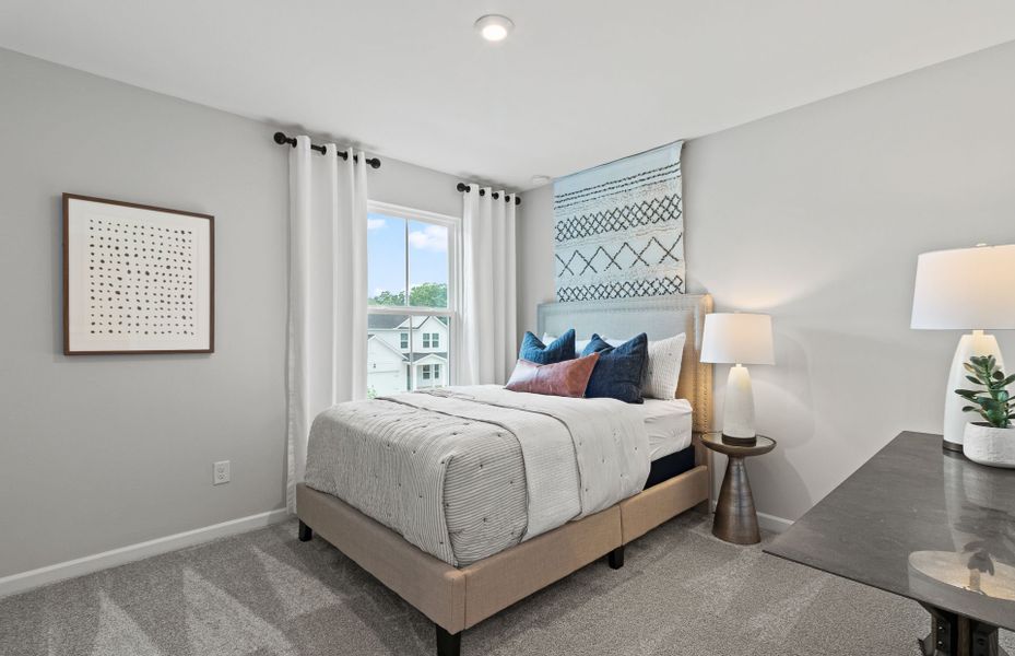 Furnished interior view inside a new home in Carpenter Falls, Durham (Image 9).