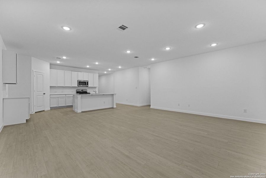 Spacious, unfurnished interior of a new home in Parkside: Coastline Collection, New Braunfels (Image 13).