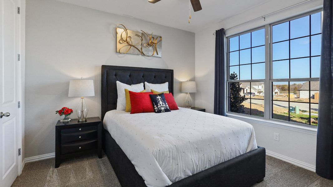 Representative furnished interior of a home built from the Hickory by Brightland Homes in Sunterra, Katy (Image 11).