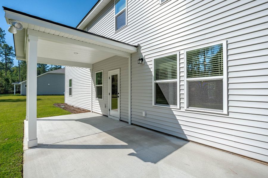 Exterior details and patio area of a home in Oakleaf Chase, Blythewood (Image 24).
