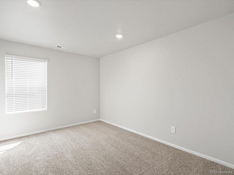 Spacious, unfurnished interior of a new home in Poudre Heights: The Lakes Collection, Windsor (Image 18).