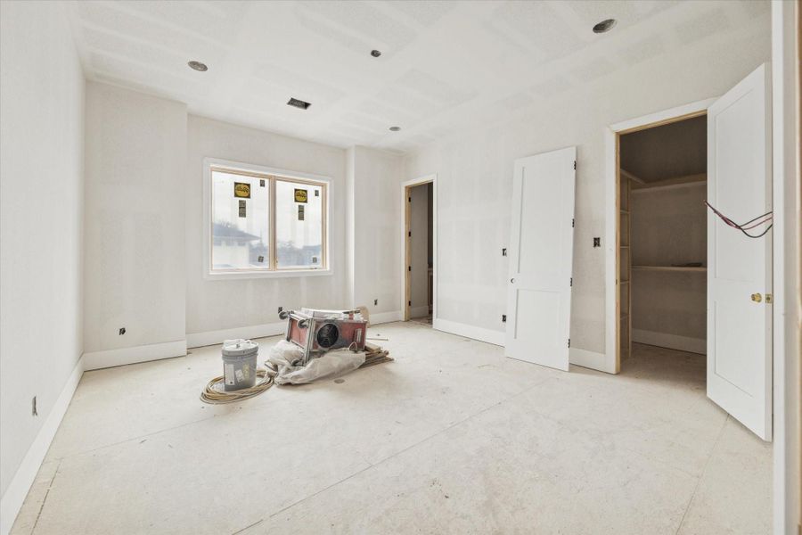 Well-appointed secondary bedroom featuring high ceilings and a private en-suite bathroom. This bright and inviting space offers a versatile layout with clean modern lines and large windows that provide an abundance of natural light. Well-appointed secondary bedroom featuring high ceilings and a private en-suite bathroom. This bright and inviting space offers a versatile layout with clean modern lines and large windows that provide an abundance of natural light.