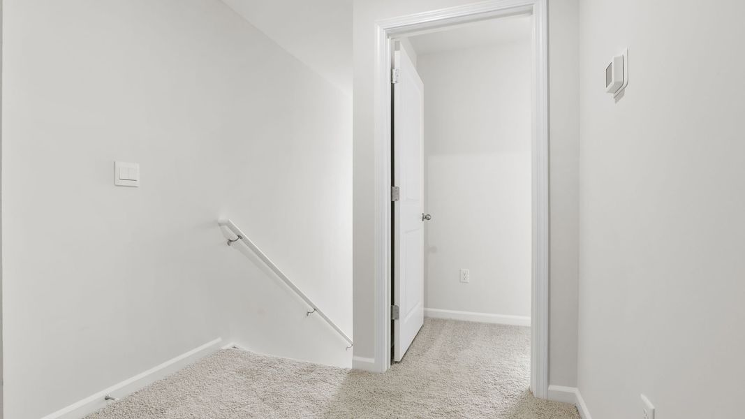 Spacious, unfurnished interior of a new home in Tanglewood Townes, Greenville (Image 20).