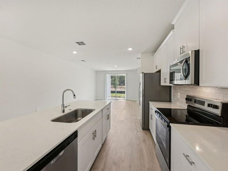 Furnished interior view inside a new home in , Lady Lake (Image 2). Furnished interior view inside a new home in , Lady Lake (Image 2).