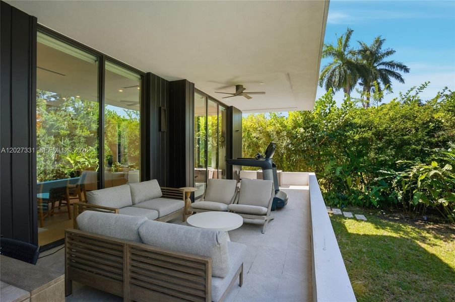 Exterior details and patio area of a home in , Miami Beach (Image 23). Exterior details and patio area of a home in , Miami Beach (Image 23).