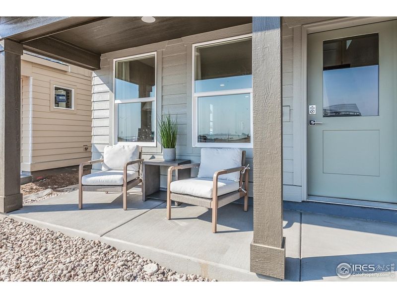 Exterior details and patio area of a home in Prairie Song Cottages, Windsor (Image 3).