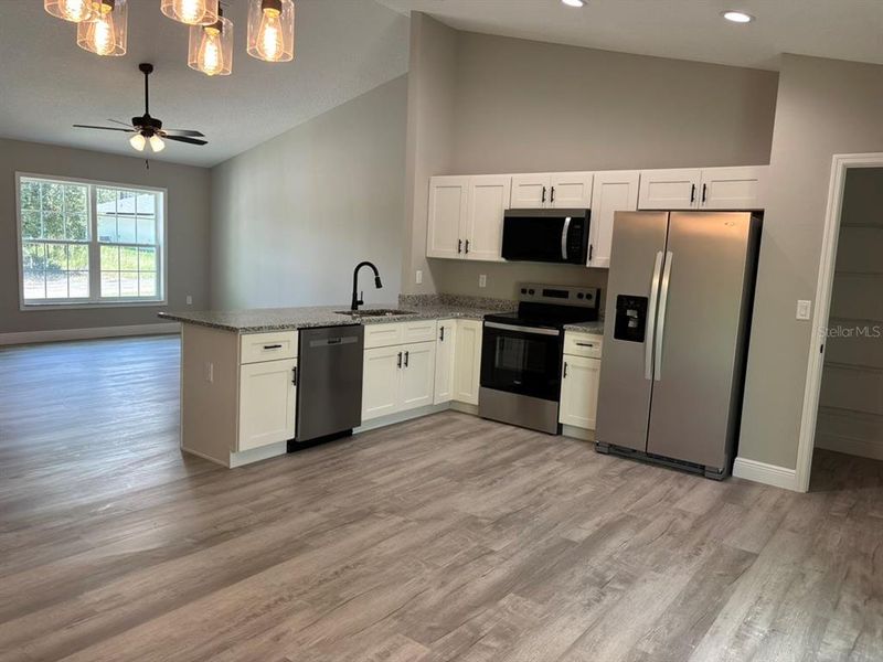 Furnished interior view inside a new home in , Dunnellon (Image 7).