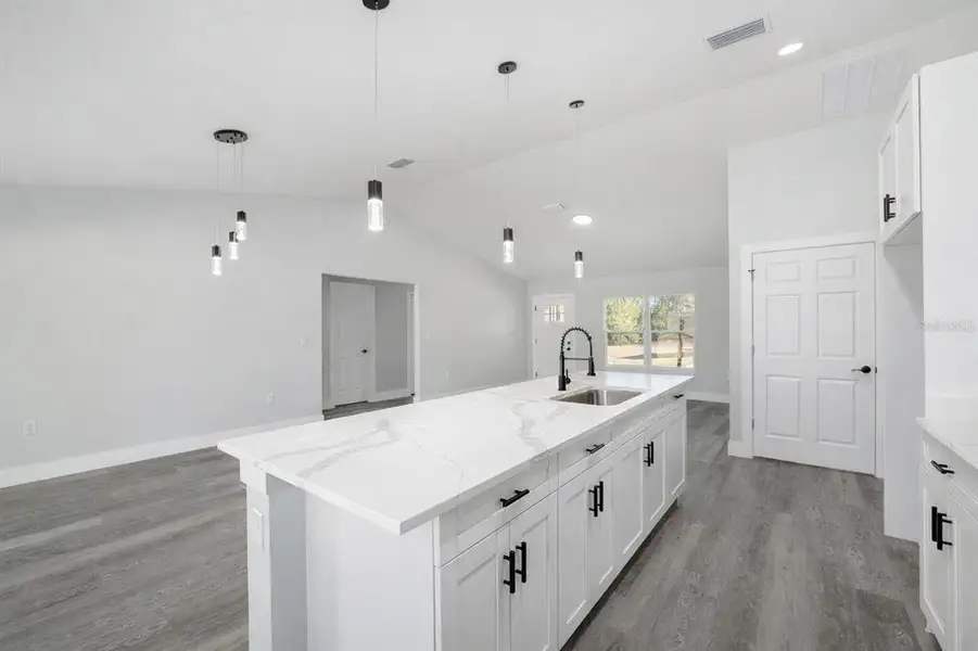 Furnished interior view inside a new home in , Dunnellon (Image 5).