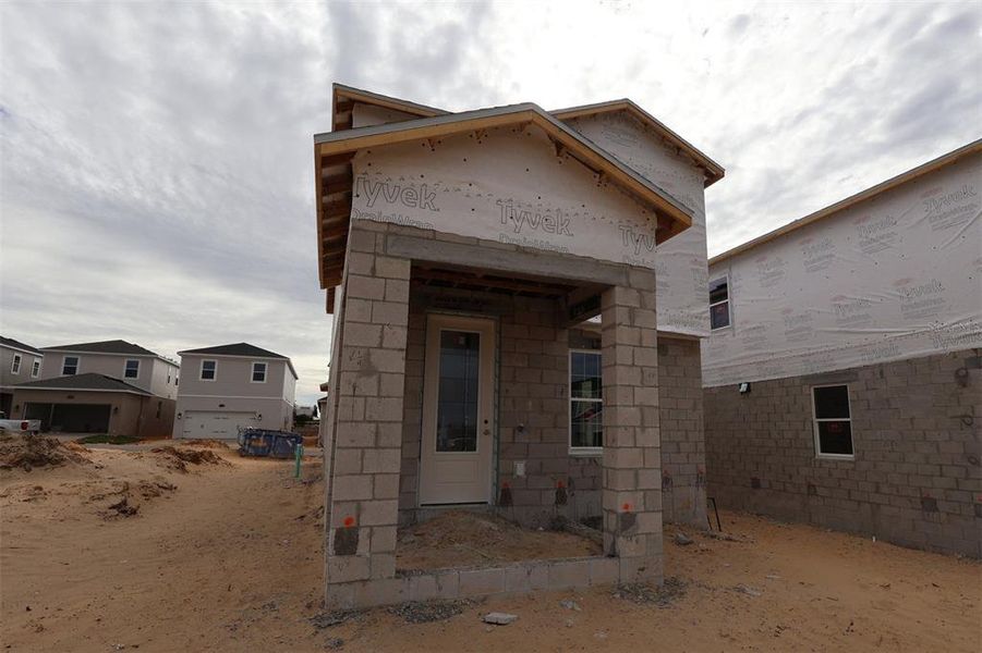 In-progress construction of a new home in Lake Star at Ovation, Winter Garden, FL (Image 5).