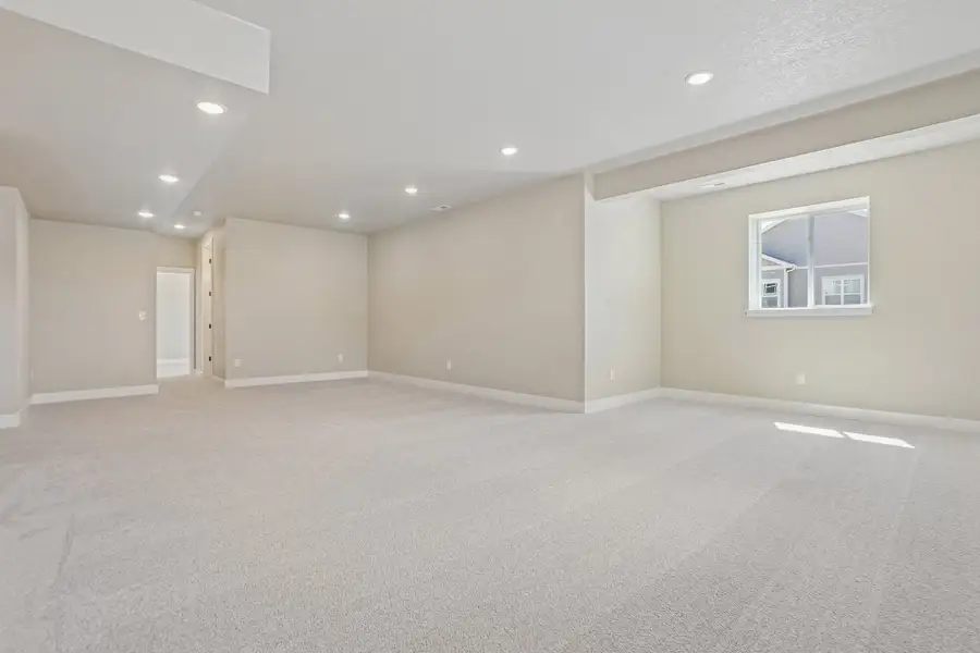 Spacious, unfurnished interior of a new home in Jackson Creek North, Monument (Image 60).