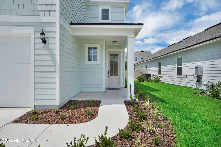 Exterior details and patio area of a home in Reflections at Nocatee, Ponte Vedra (Image 3).