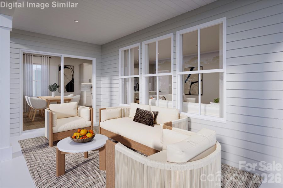 Outdoor Living. The covered porch invites you to bring the conversation outside — a cozy, stylish space perfect for relaxing or gathering year-round.
