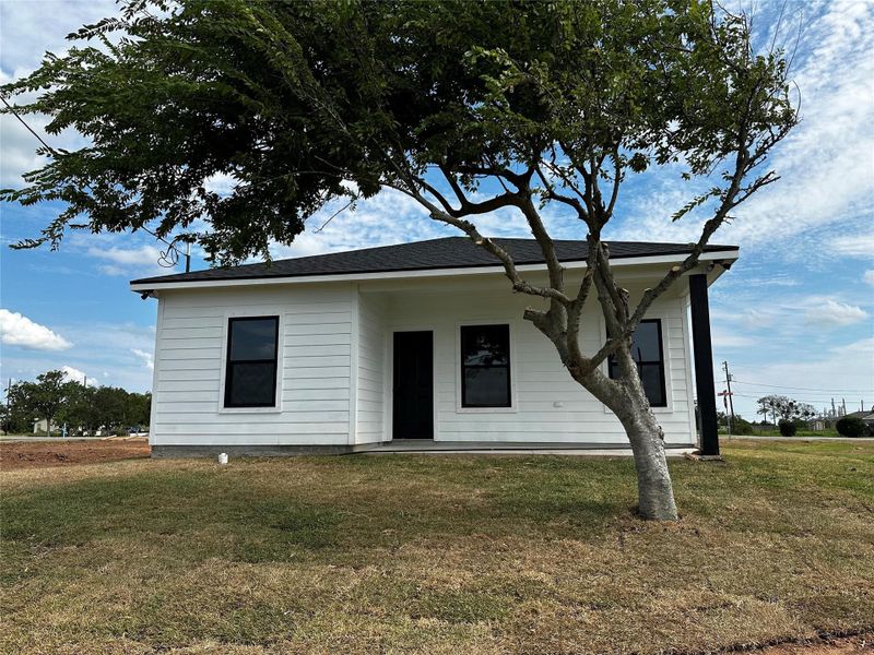 Front exterior of a new home in , Freeport, TX, highlighting curb appeal (Image 16). Front exterior of a new home in , Freeport, TX, highlighting curb appeal (Image 16).