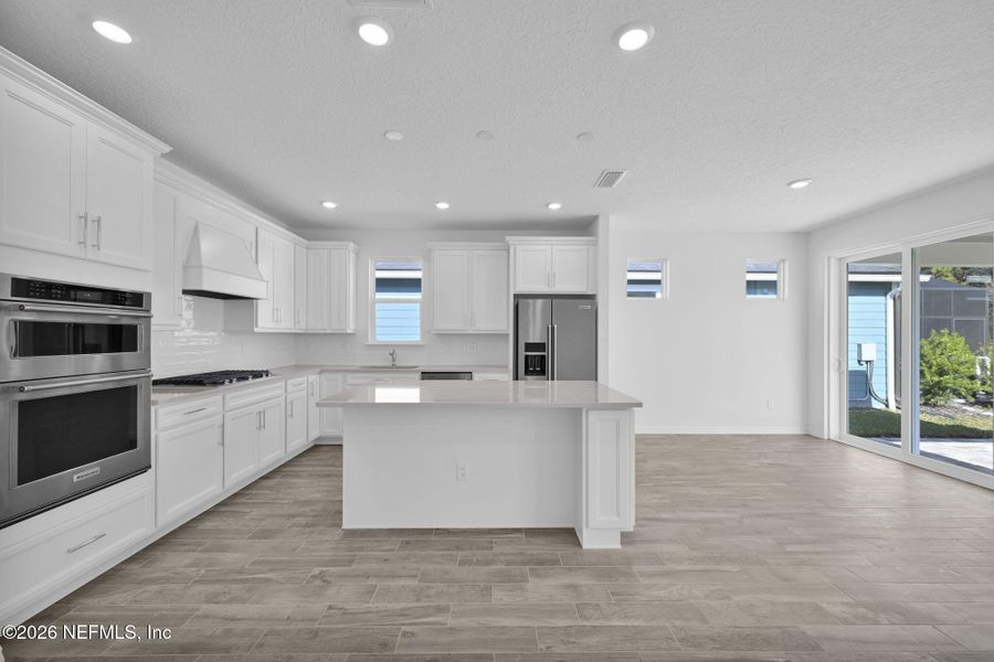 Furnished interior view inside a new home in Del Webb Wildlight, Yulee (Image 6).