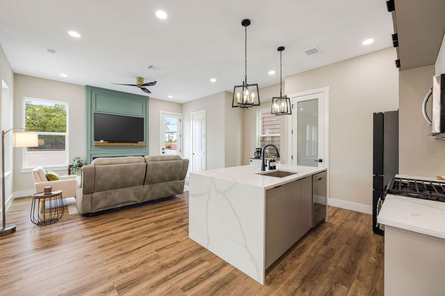 Spacious open living area designed for modern living with effortless flow between the kitchen and family room. Spacious open living area designed for modern living with effortless flow between the kitchen and family room.