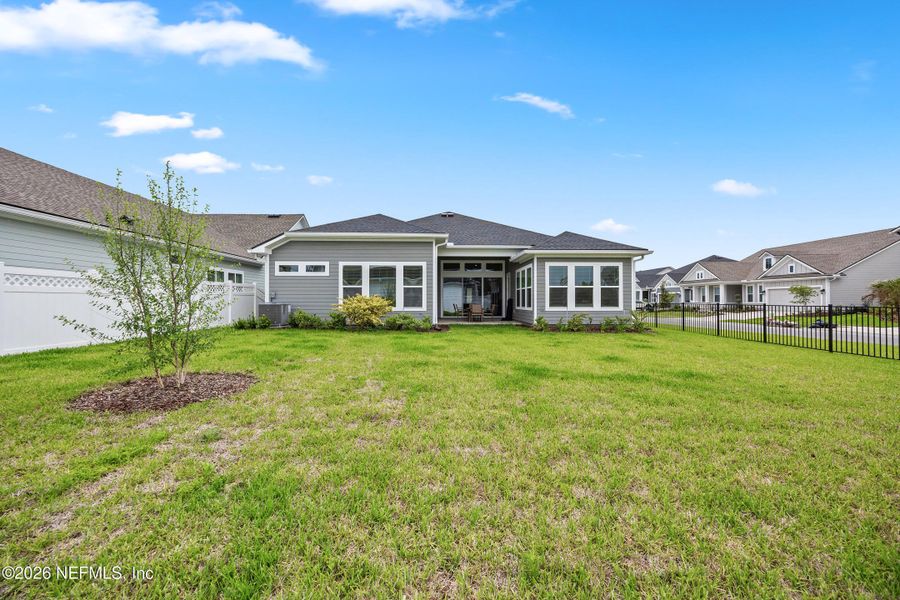 Exterior details and patio area of a home in Oak Grove at SilverLeaf 60’, St. Augustine (Image 3).
