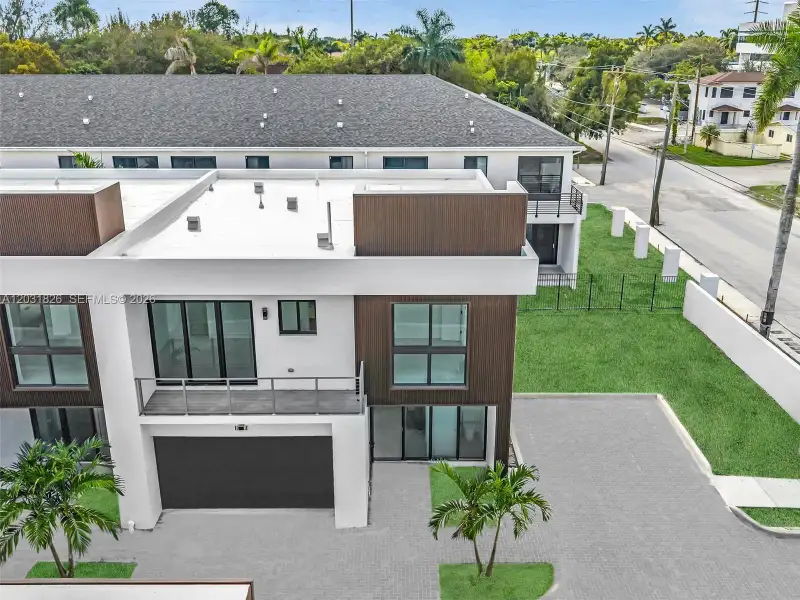 Front exterior of a new home in , Dania Beach, FL, highlighting curb appeal (Image 39).