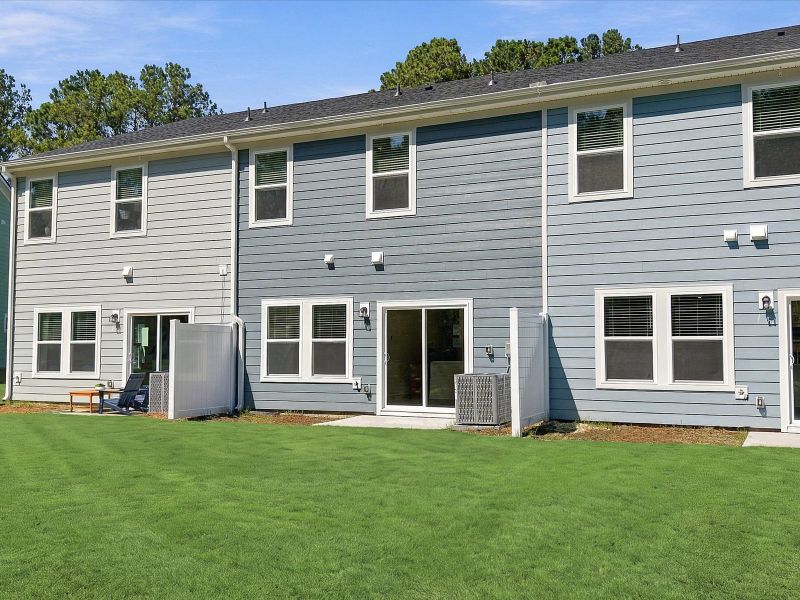 Exterior details and patio area of a home in Courts at Brook Run, Moncks Corner (Image 3).