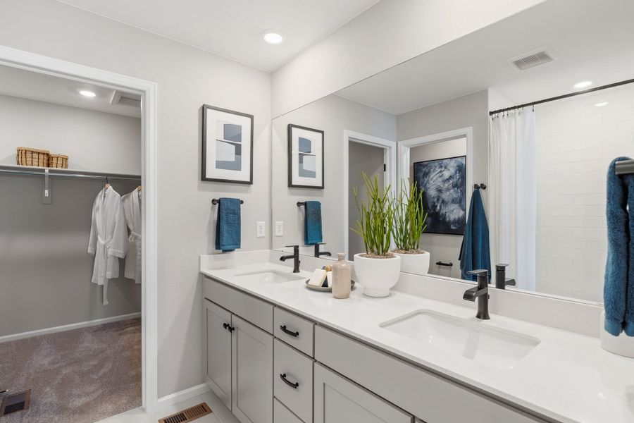 Representative furnished interior of a home built from the 2403 by Risewell Homes in Harvest Crossing, Aurora (Image 26).