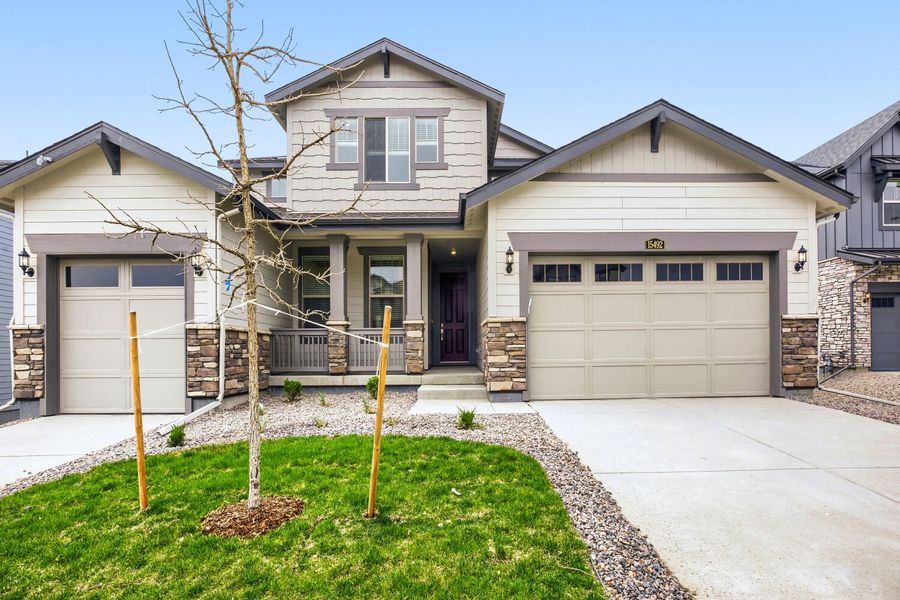 Front exterior of a new home in Red Rocks Ranch, Morrison, CO, highlighting curb appeal (Image 1). Front exterior of a new home in Red Rocks Ranch, Morrison, CO, highlighting curb appeal (Image 1).