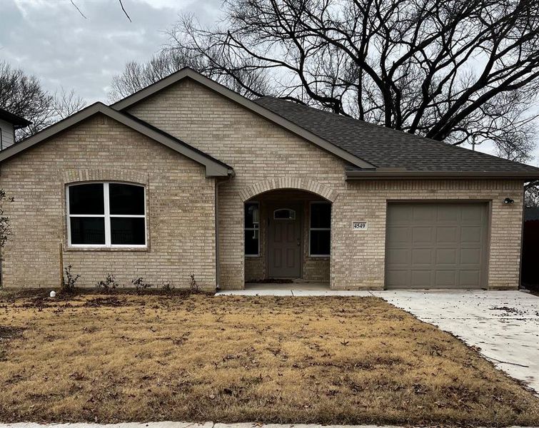 View of front of home with a garage