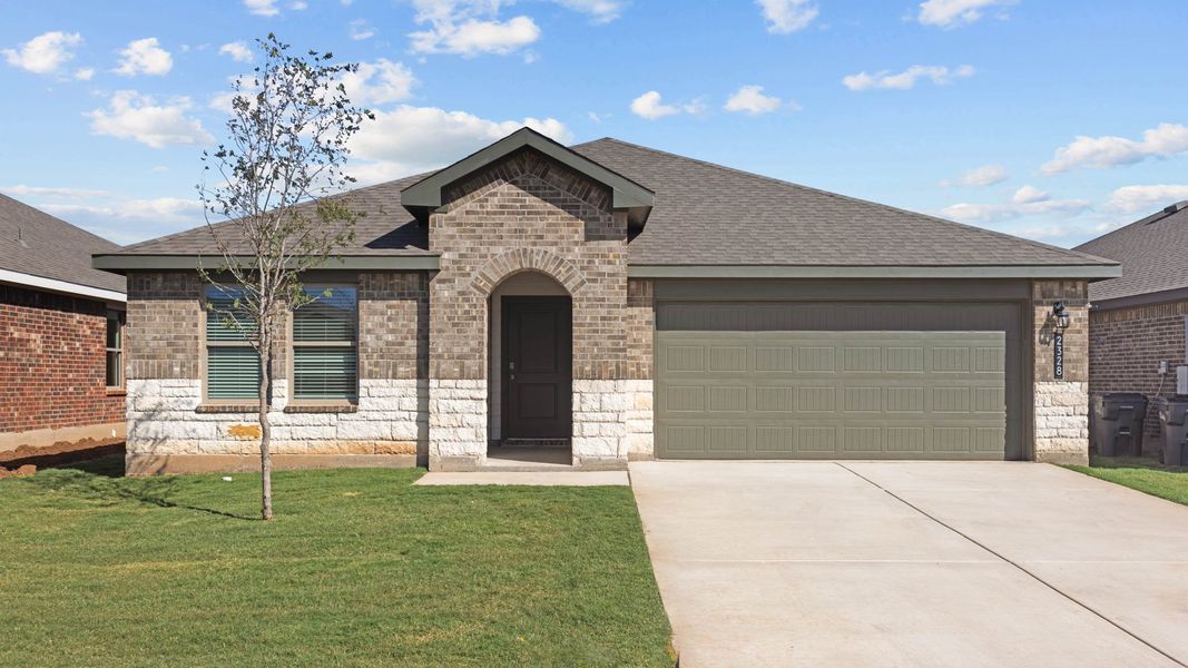 Representative exterior photo of a completed home built from the The Lakeway by D.R. Horton in Abbey Glen, Lubbock, TX (Image 1).
