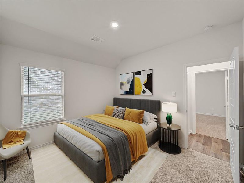 Carpeted bedroom featuring recessed lighting, visible vents, vaulted ceiling, and baseboards