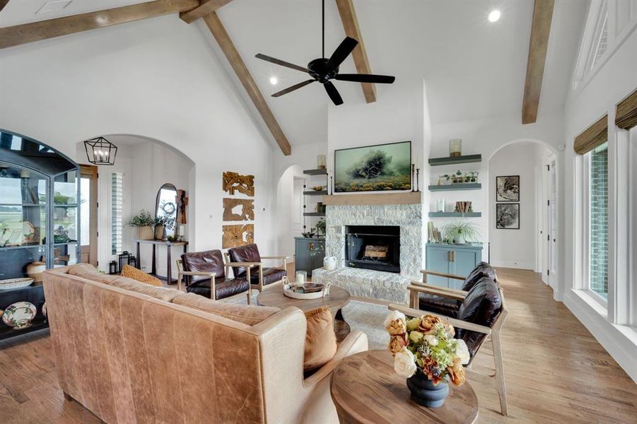Gorgeous stone fireplace with custom built ins!
