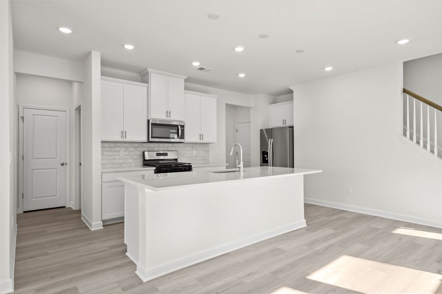 Furnished interior view inside a new home in Waterside - Boardwalk Series, Longs (Image 7). Furnished interior view inside a new home in Waterside - Boardwalk Series, Longs (Image 7).