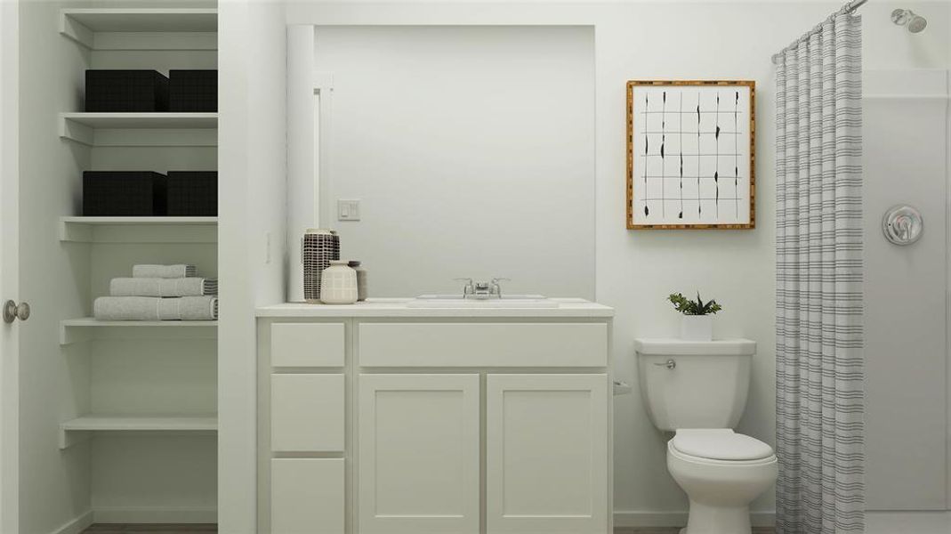 Bathroom with vanity and toilet