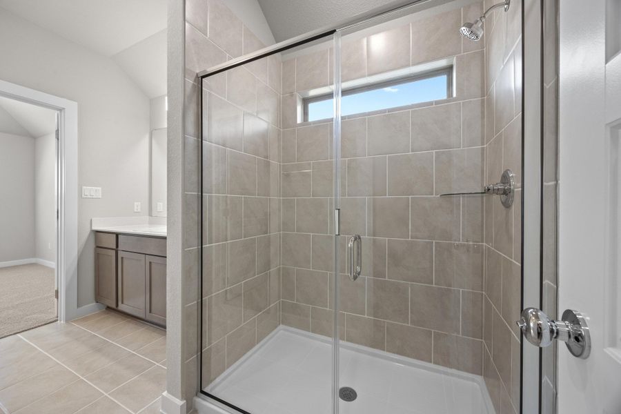 Primary Bathroom in the Cypress home plan by Trophy Signature Homes - REPRESENTATIVE PHOTO Primary Bathroom in the Cypress home plan by Trophy Signature Homes - REPRESENTATIVE PHOTO
