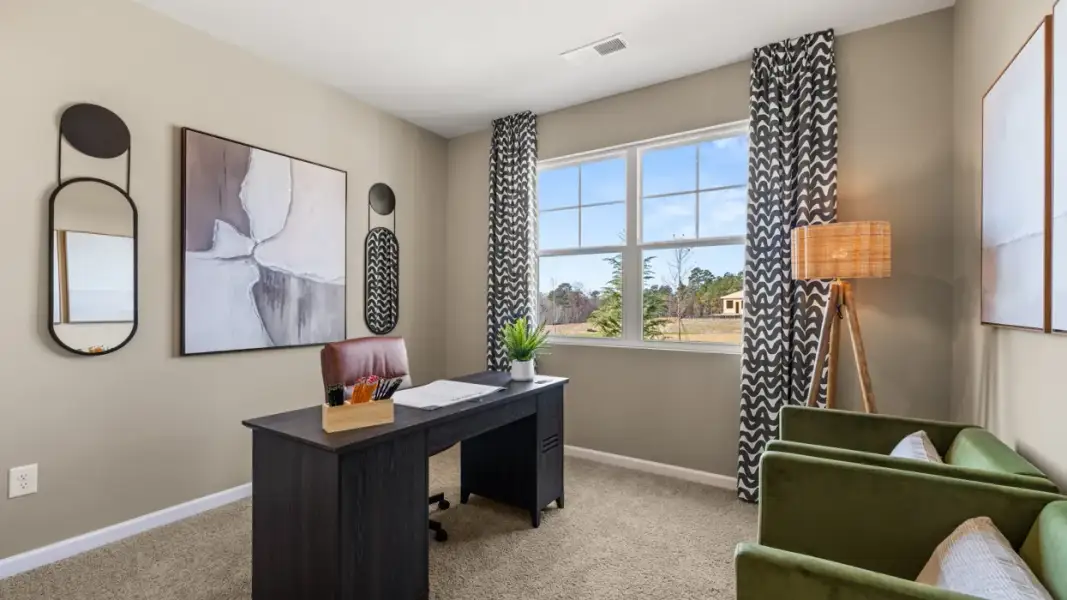 Representative furnished interior of a home built from the Aria by D.R. Horton in Walden Ridge, Macon (Image 25).