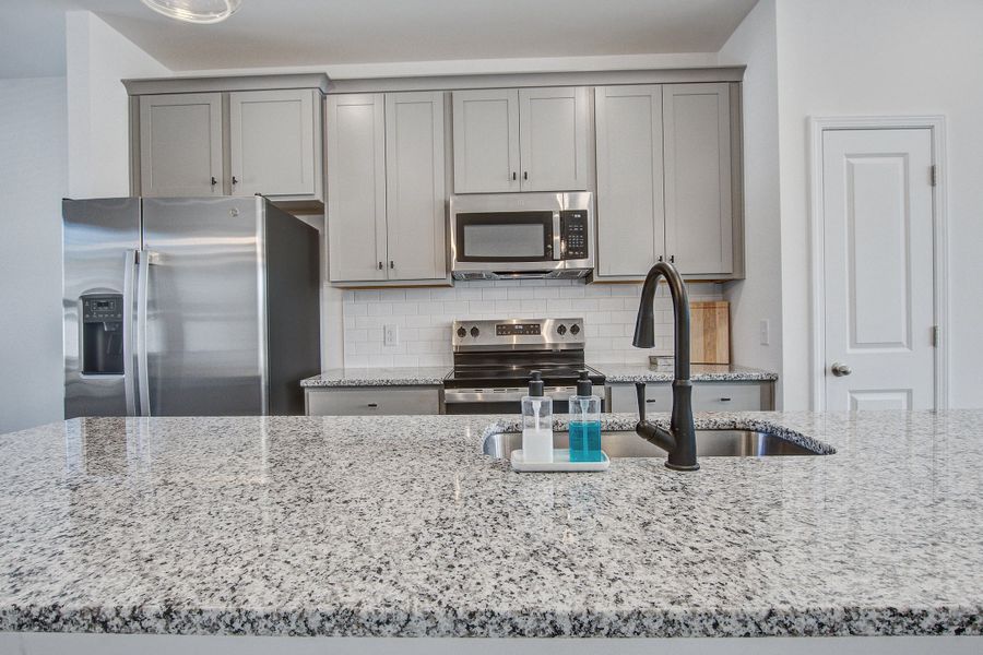 Furnished interior view inside a new home in Clear Springs Townhomes, North Charleston (Image 7).