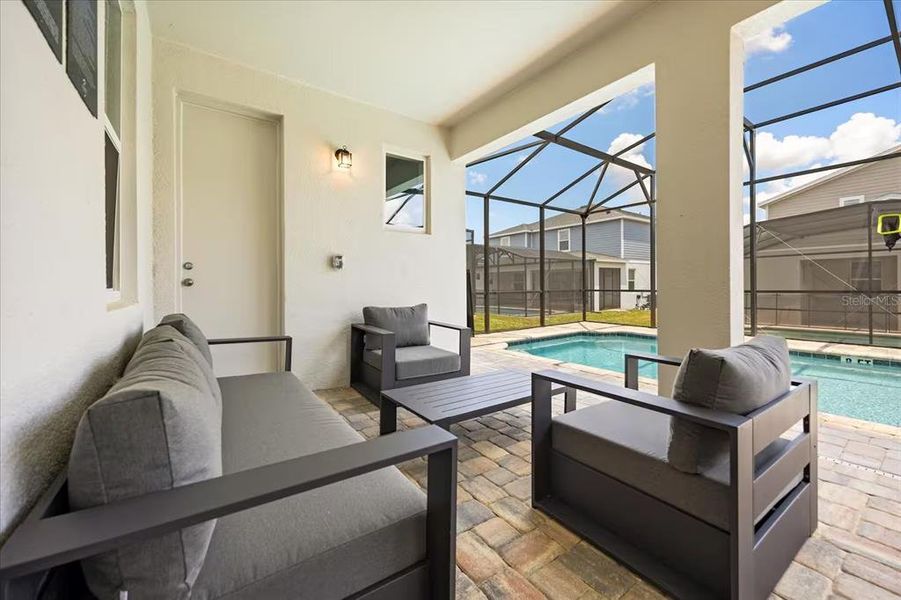 Exterior details and patio area of a home in Solara Resort, Kissimmee (Image 4).