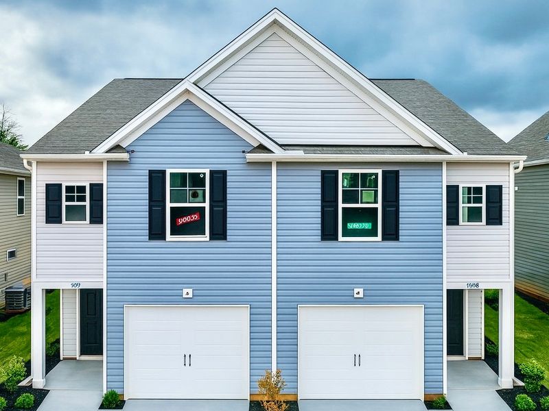 Front exterior of a new home in Champions Village at Cherry Hill, Pendleton, SC, highlighting curb appeal (Image 1).