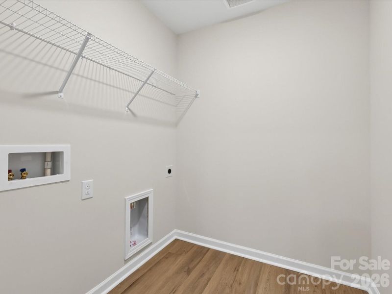 Spacious, unfurnished interior of a new home in North Creek Village, Huntersville (Image 35).