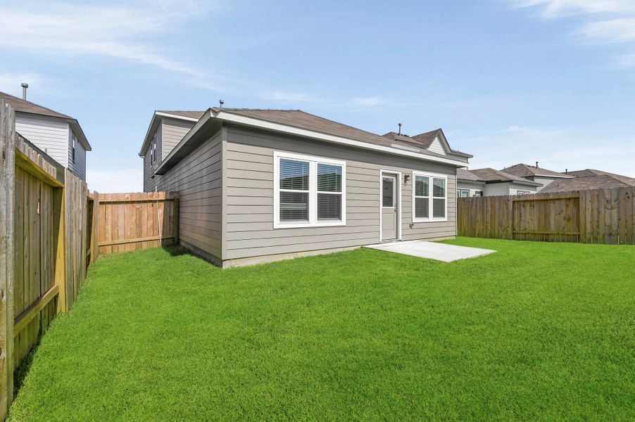 Exterior details and patio area of a home in Barrett Crossing, Crosby (Image 3).