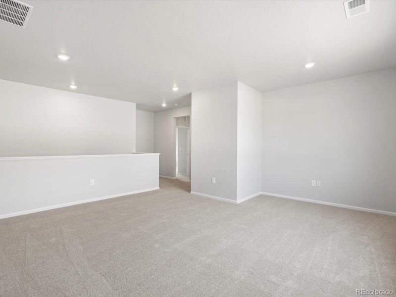 Spacious, unfurnished interior of a new home in Poudre Heights: The Alpine Collection, Windsor (Image 25).