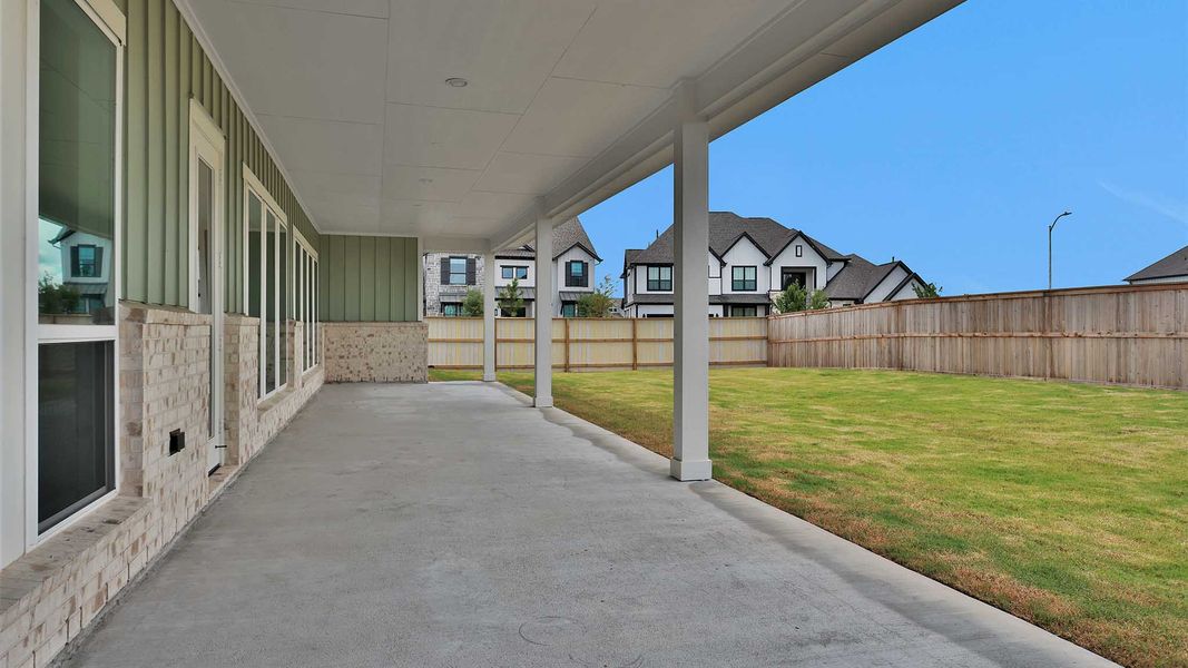 Exterior details and patio area of a home in Fulshear Lakes, Fulshear (Image 3).
