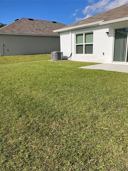 Exterior details and patio area of a home in Sunset Hills, Summerfield (Image 3).