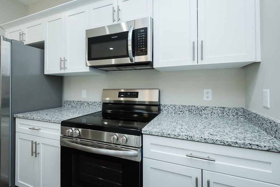 Representative furnished interior of a home built from the TH 1442 INT by Foundation Home Builders LLC in Stokesburg Road Townhomes, Walnut Cove (Image 6).
